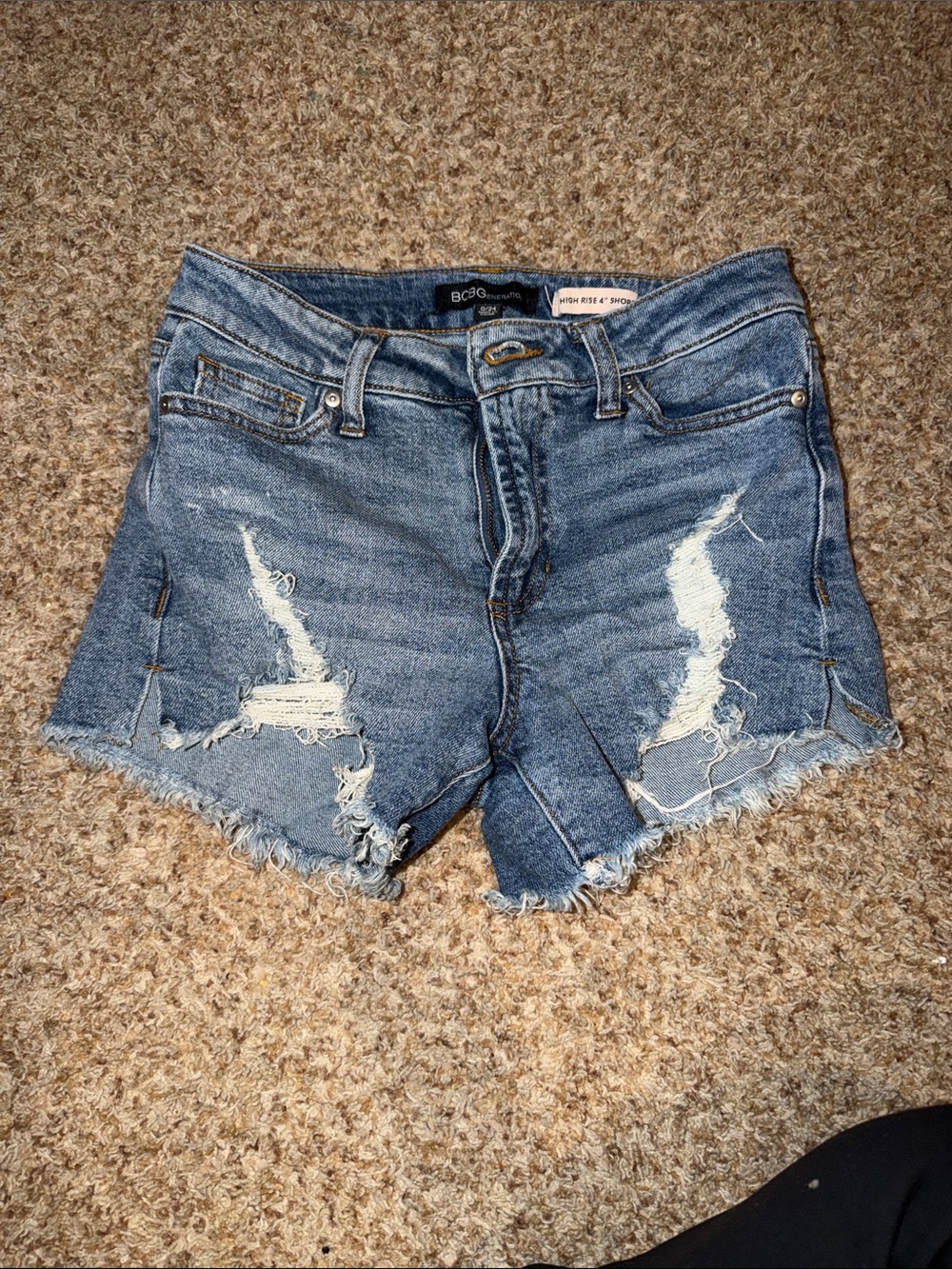 BCBG Generation denim high rise 4" shorts feature a light blue wash